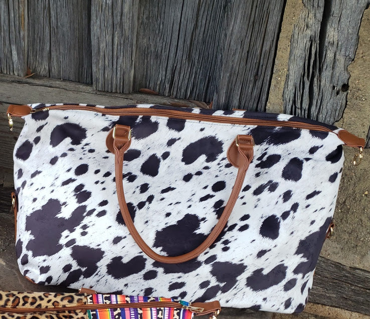 COWHIDE PRINT WEEKENDER BAG